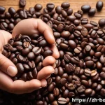바리스타 커피 레시피 개발 노하우 - A detailed close-up of diverse coffee beans from different origins displayed on a rustic wooden tabl...